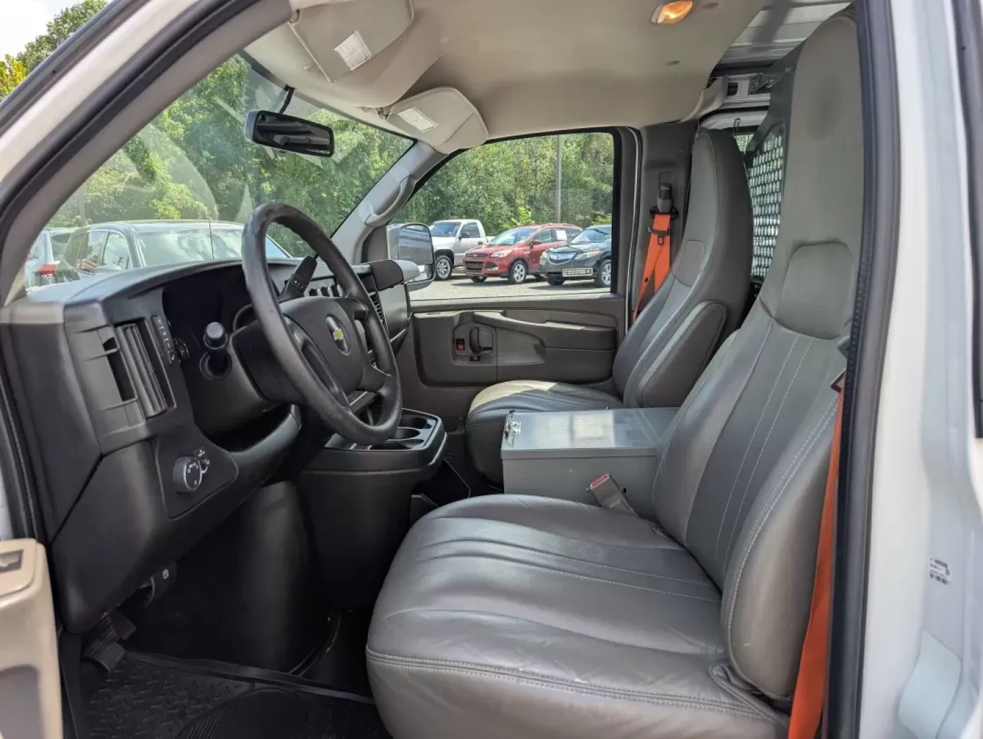 2015 /Medium Pewter Chevrolet Express Cargo Van (1GCWGFCF1F1) with an Other engine, located at 804 22nd Ave, Phenix City, AL, 36870, (334) 297-1860, 32.484749, -85.024475 - Are you in the market for a reliable vehicle that can tackle tough jobs while providing you with the comfort and tech features you need? Look no further than this 2015 Chevrolet Express Cargo Van, available at Gils Auto in Phenix City, AL. This full-size cargo van is not just a vehicle; it's a versa - Photo#10