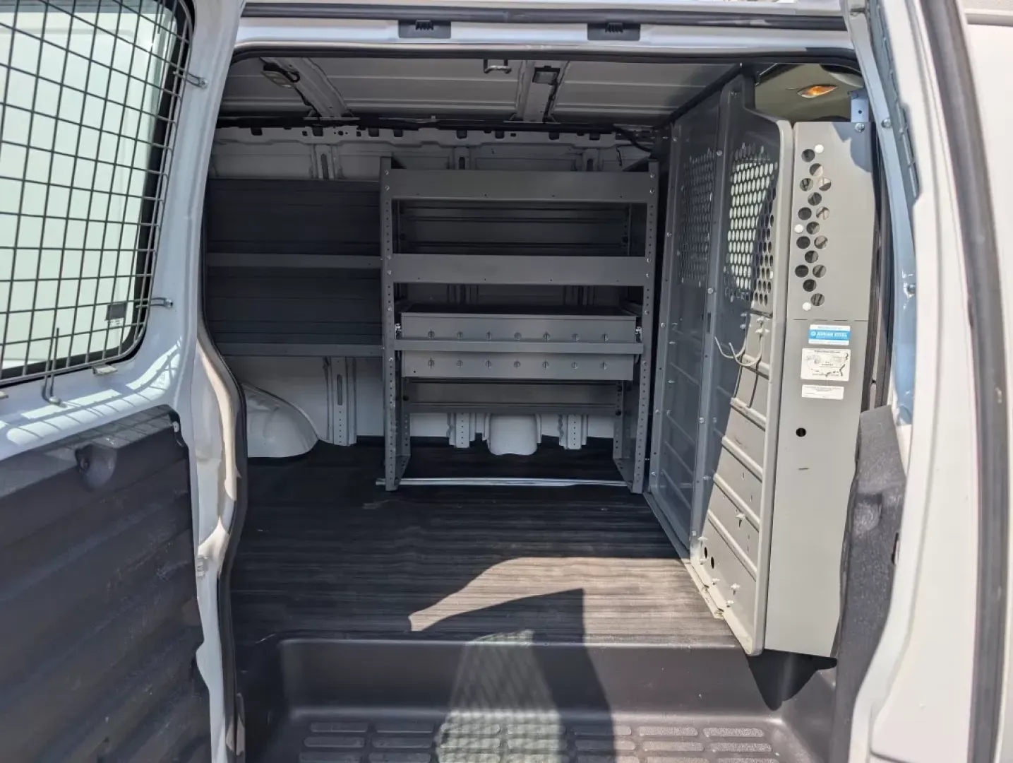 2015 /Medium Pewter Chevrolet Express Cargo Van (1GCWGFCF1F1) with an Other engine, located at 804 22nd Ave, Phenix City, AL, 36870, (334) 297-1860, 32.484749, -85.024475 - Are you in the market for a reliable vehicle that can tackle tough jobs while providing you with the comfort and tech features you need? Look no further than this 2015 Chevrolet Express Cargo Van, available at Gils Auto in Phenix City, AL. This full-size cargo van is not just a vehicle; it's a versa - Photo#12