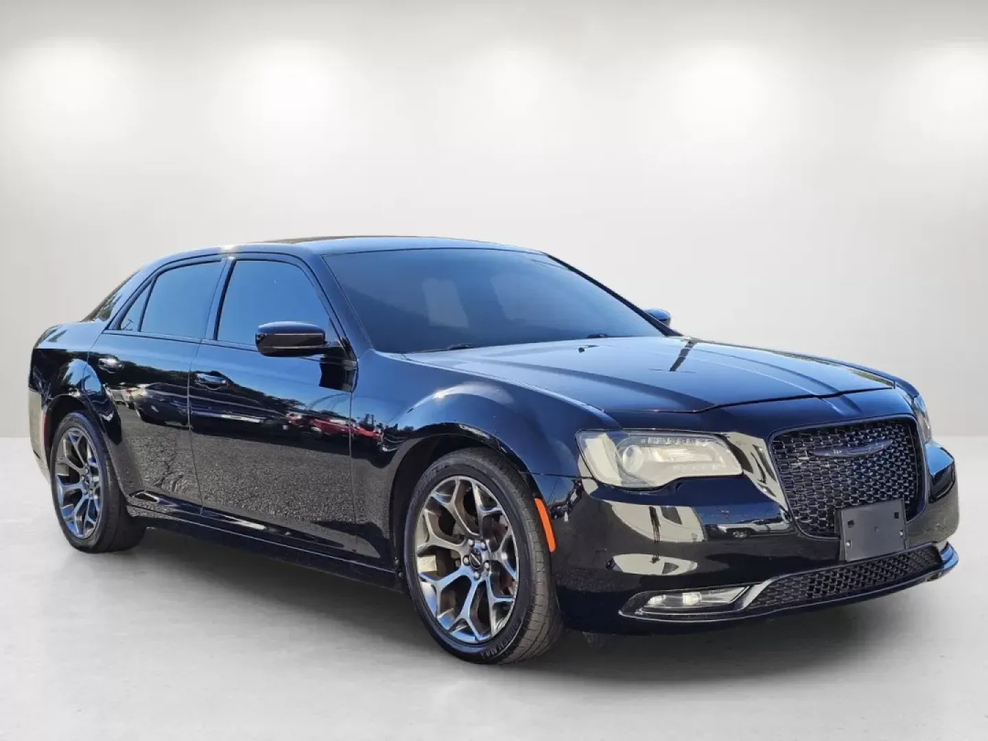 2015 /Black Chrysler 300 300S (2C3CCABG4FH) with an Other engine, located at 7000 Northlake Connector, Columbus, GA, 31904, (706) 987-8085, 32.524975, -84.978134 - **Elevate Your Drive with the 2015 Chrysler 300S: A Perfect Blend of Style and Comfort**<br /> <br /> If you're searching for a car that combines luxury with performance, look no further than the 2015 Chrysler 300S available at Gils Auto in Phenix City, AL. This striking sedan, finished in a stunnin - Photo#2