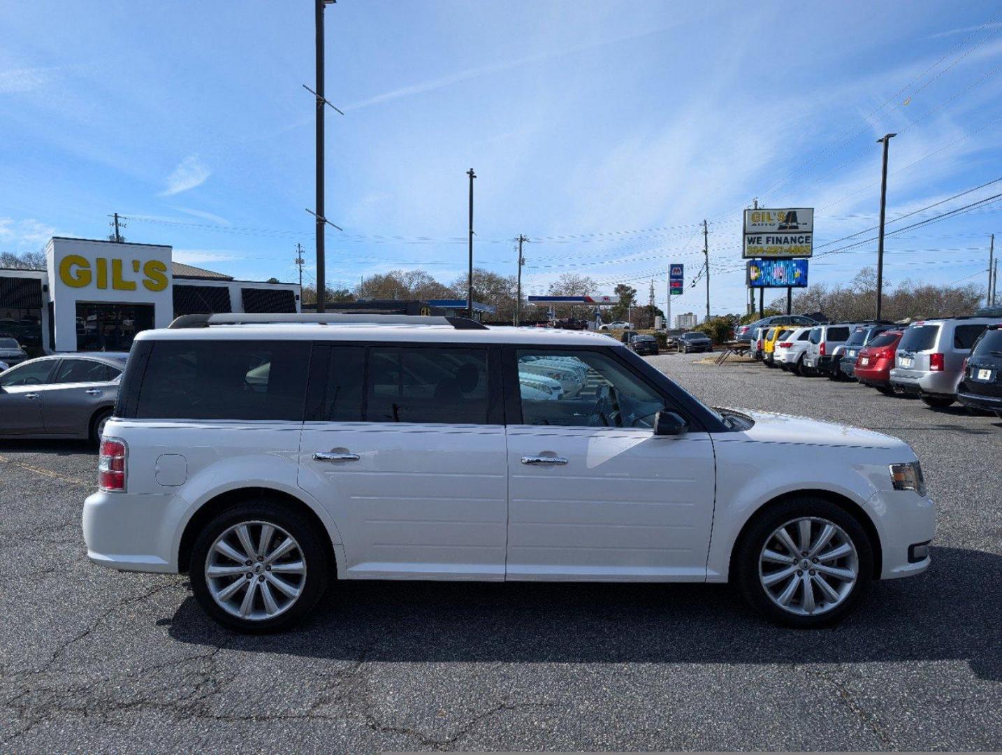 2015 Ford Flex SEL (2FMGK5C81FB) with an Regular Unleaded V-6 3.5 L/213 engine, 6-Speed Automatic w/OD transmission, located at 3959 U.S. 80 W, Phenix City, AL, 36870, (334) 297-4885, 32.469296, -85.135185 - 2015 Ford Flex SEL - Photo#4