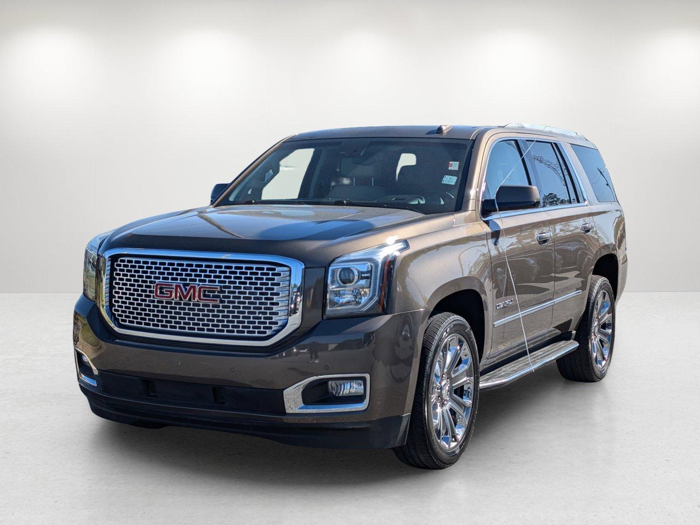 2015 /Cocoa/Shale GMC Yukon Denali (1GKS1CKJ9FR) with an Gas V8 6.2L/378 engine, 8-Speed Automatic transmission, located at 3959 U.S. 80 W, Phenix City, AL, 36870, (334) 297-4885, 32.469296, -85.135185 - 2015 GMC Yukon Denali - Photo#1