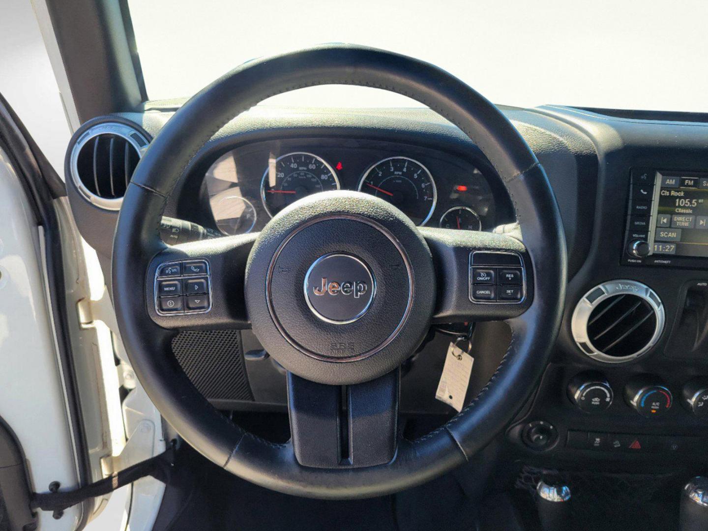 2015 Bright White Clearcoat /Black Jeep Wrangler Rubicon (1C4BJWCG4FL) with an Regular Unleaded V-6 3.6 L/220 engine, 5-Speed Automatic w/OD transmission, located at 804 22nd Ave, Phenix City, AL, 36870, (334) 297-1860, 32.484749, -85.024475 - 2015 Jeep Wrangler Rubicon - Photo#12