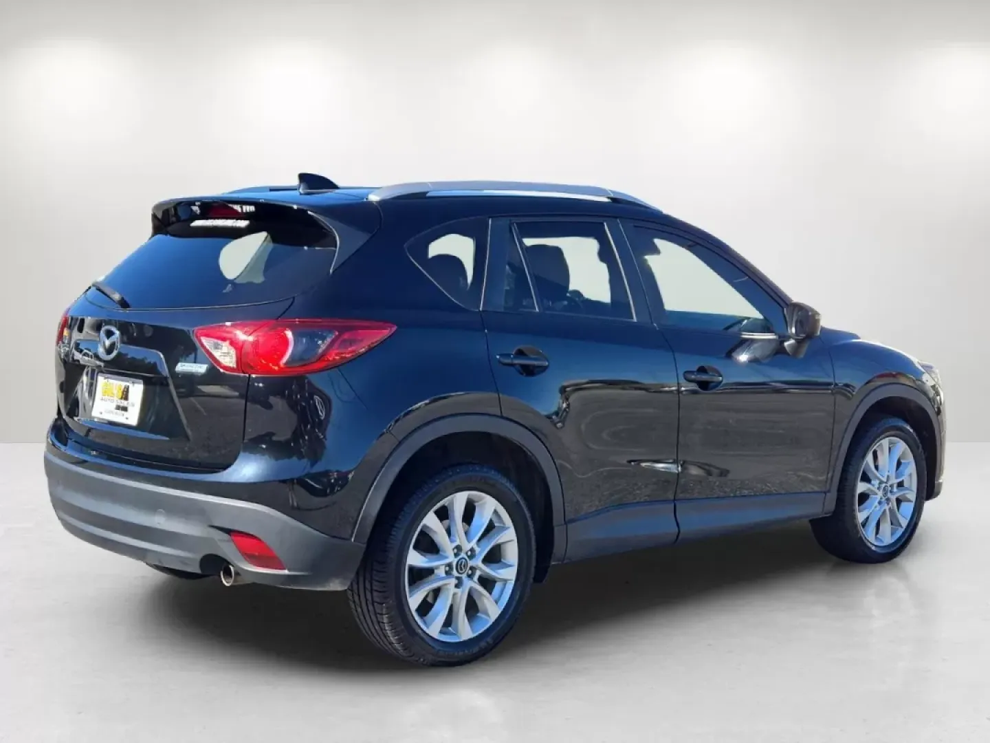 2015 /Black Mazda CX-5 Grand Touring (JM3KE2DYXF0) with an Other engine, located at 1430 Gateway Drive, Opelika, AL, 36801, (334) 239-0944, 32.637871, -85.409790 - **Discover the Perfect SUV for Your Next Adventure: 2015 Mazda CX-5 Grand Touring at Gils Auto - Phenix City**<br /> <br /> Are you searching for a versatile vehicle that seamlessly fits your active lifestyle? Look no further than the 2015 Mazda CX-5 Grand Touring, available now at Gils Auto in Phen - Photo#5
