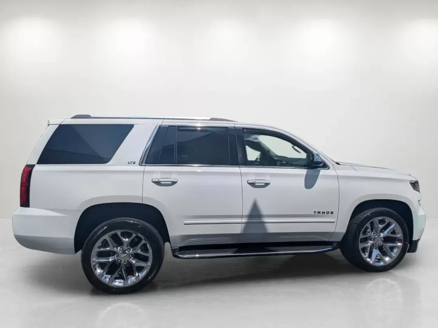 2016 /Cocoa/Dune Chevrolet Tahoe LTZ (1GNSKCKC8GR) with an Gas/Ethanol V8 5.3L/325 engine, 6-Speed Automatic transmission, located at 7000 Northlake Connector, Columbus, GA, 31904, (706) 987-8085, 32.524975, -84.978134 - ### Discover the Ultimate Family SUV: 2016 Chevrolet Tahoe LTZ at Gils Auto - Columbus #2<br /> <br /> Are you ready to elevate your family adventures? The 2016 Chevrolet Tahoe LTZ is not just a vehicle; it's a lifestyle enhancer that brings comfort, safety, and luxury to every journey. Perfect for - Photo#3