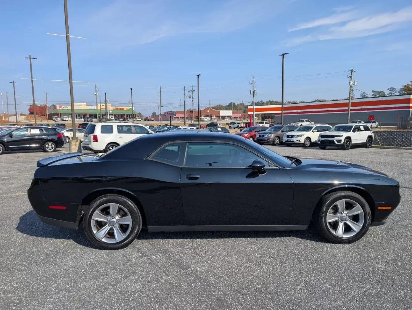 2016 /Black Dodge Challenger SXT (2C3CDZAG5GH) with an Other engine, located at 3959 U.S. 80 W, Phenix City, AL, 36870, (334) 297-4885, 32.469296, -85.135185 - Are you ready to ignite your driving experience? Step into the world of powerful performance and sleek design with our stunning 2016 Dodge Challenger SXT, available now at Gils Auto in Phenix City, AL. This 2-door coupe is not just a vehicle; it's an embodiment of style and muscle, perfect for those - Photo#3