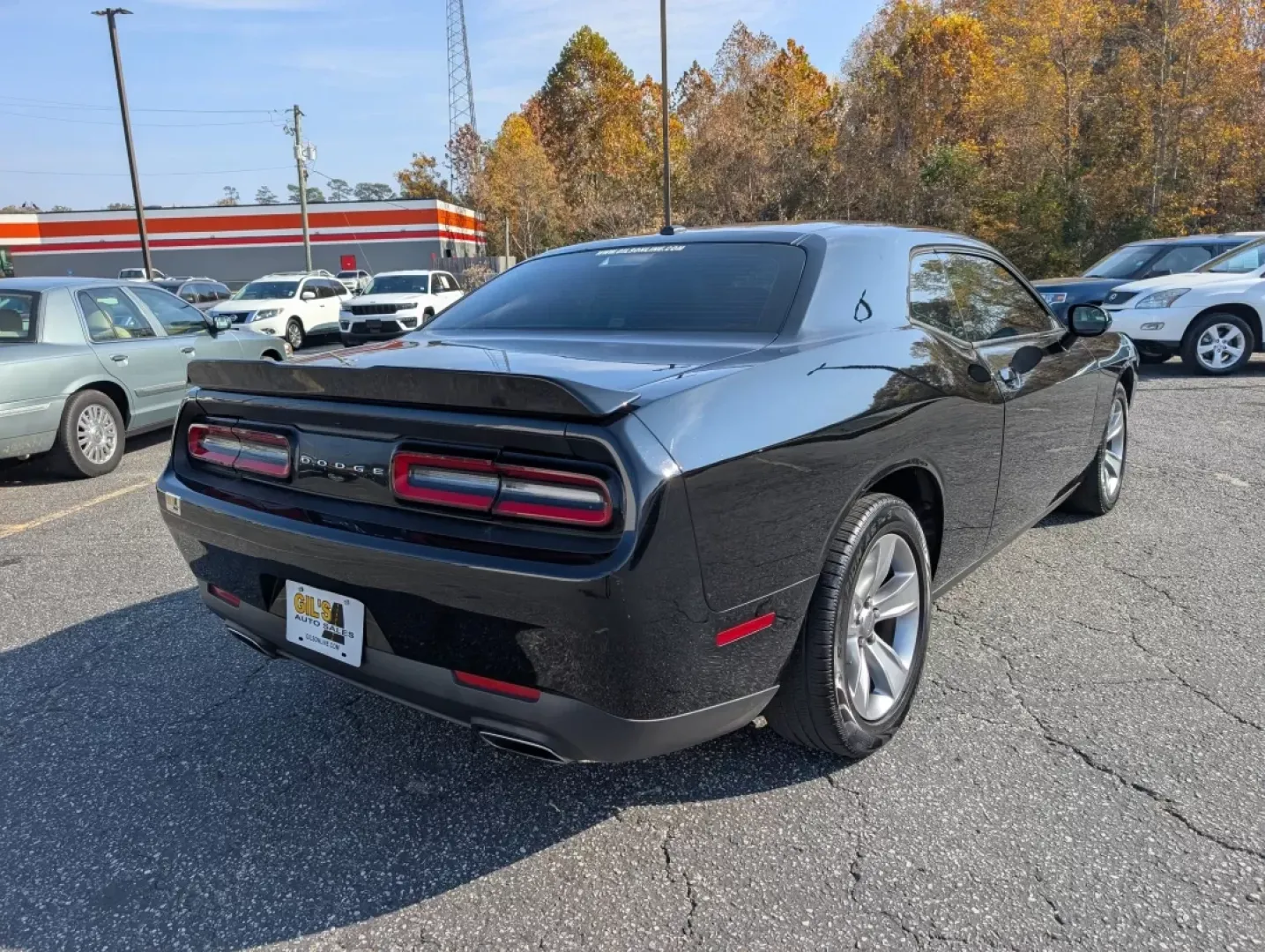 2016 /Black Dodge Challenger SXT (2C3CDZAG5GH) with an Other engine, located at 3959 U.S. 80 W, Phenix City, AL, 36870, (334) 297-4885, 32.469296, -85.135185 - Are you ready to ignite your driving experience? Step into the world of powerful performance and sleek design with our stunning 2016 Dodge Challenger SXT, available now at Gils Auto in Phenix City, AL. This 2-door coupe is not just a vehicle; it's an embodiment of style and muscle, perfect for those - Photo#4