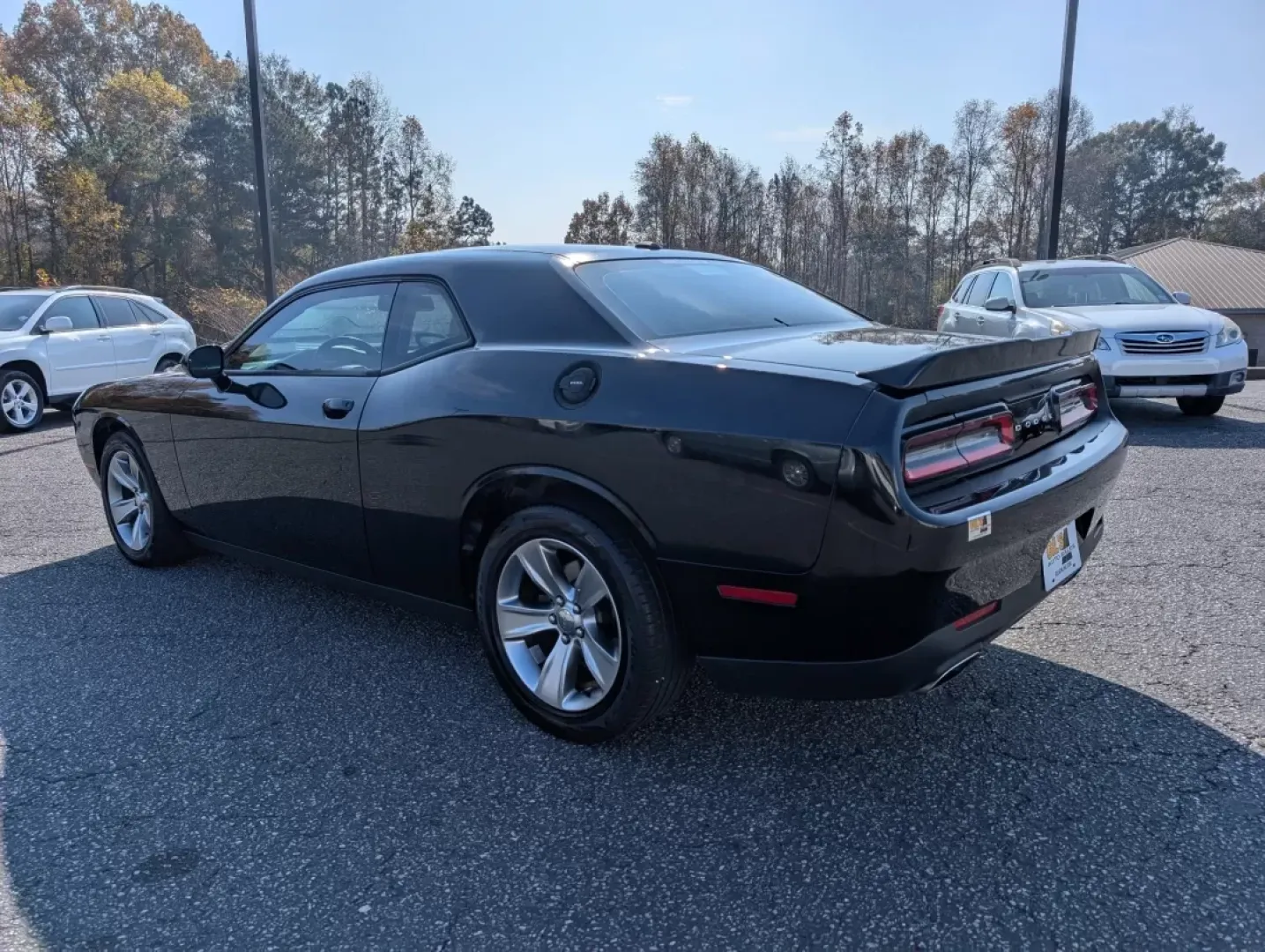 2016 /Black Dodge Challenger SXT (2C3CDZAG5GH) with an Other engine, located at 3959 U.S. 80 W, Phenix City, AL, 36870, (334) 297-4885, 32.469296, -85.135185 - Are you ready to ignite your driving experience? Step into the world of powerful performance and sleek design with our stunning 2016 Dodge Challenger SXT, available now at Gils Auto in Phenix City, AL. This 2-door coupe is not just a vehicle; it's an embodiment of style and muscle, perfect for those - Photo#6