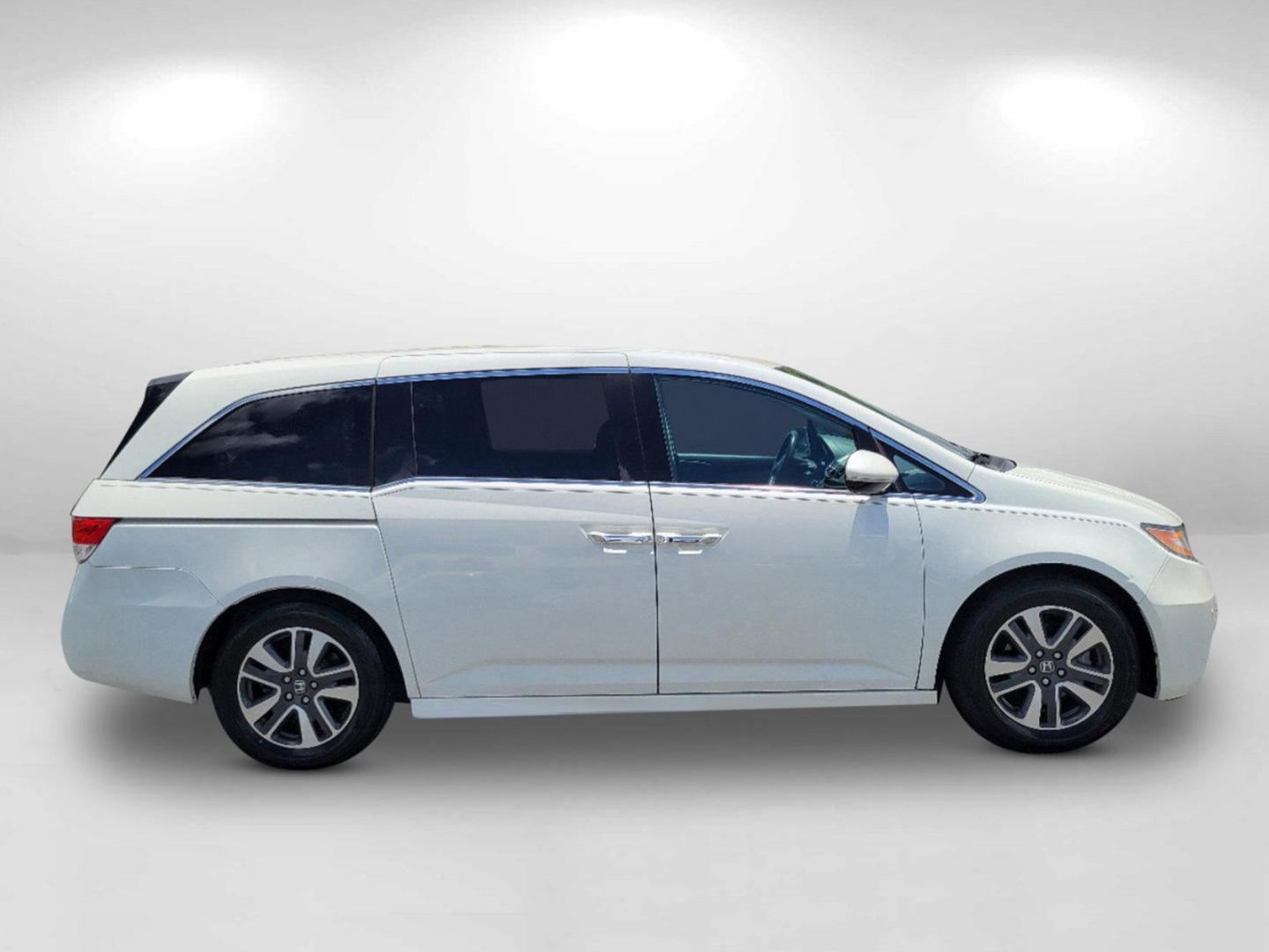 2016 White Honda Odyssey Touring Elite (5FNRL5H96GB) with an Regular Unleaded V-6 3.5 L/212 engine, 6-Speed Automatic w/OD transmission, located at 1430 Gateway Drive, Opelika, AL, 36801, (334) 239-0944, 32.637871, -85.409790 - 2016 Honda Odyssey Touring Elite - Photo#3