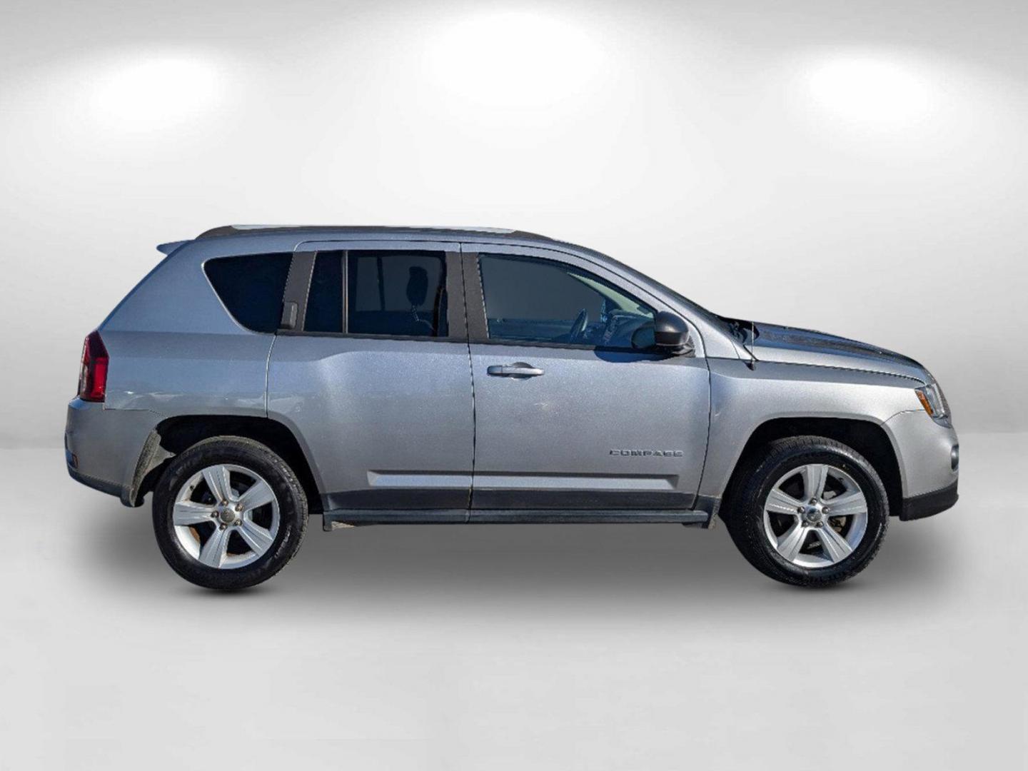 2016 /Dark Slate Gray Jeep Compass Sport (1C4NJDBB6GD) with an Regular Unleaded I-4 2.4 L/144 engine, 6-Speed Automatic w/OD transmission, located at 804 22nd Ave, Phenix City, AL, 36870, (334) 297-1860, 32.484749, -85.024475 - 2016 Jeep Compass Sport - Photo#4