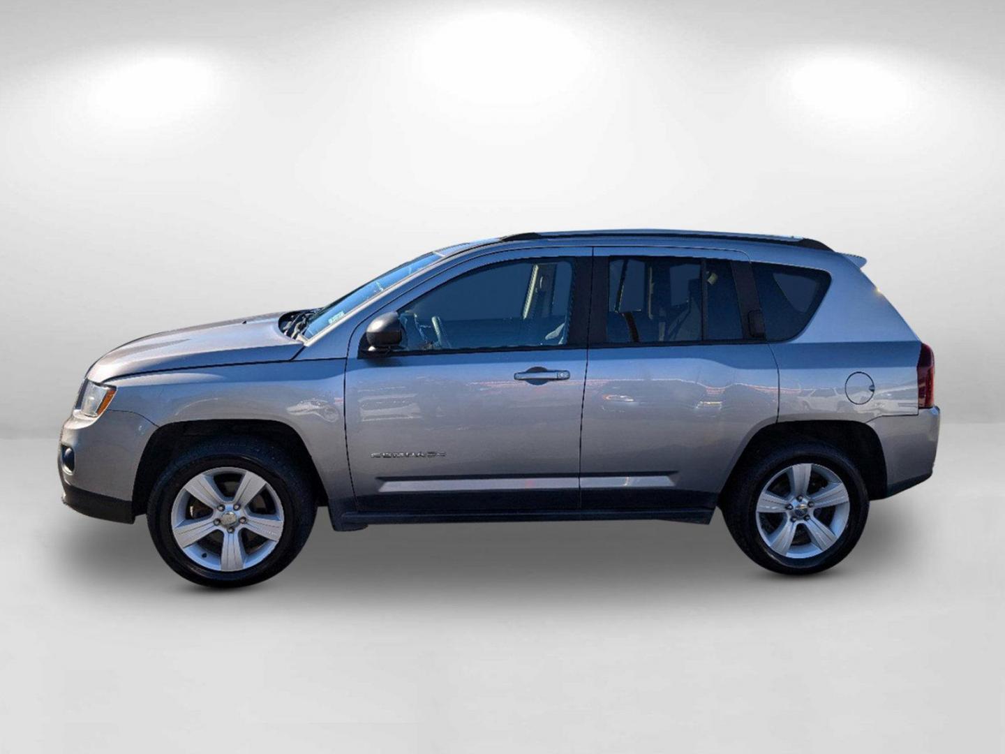 2016 /Dark Slate Gray Jeep Compass Sport (1C4NJDBB6GD) with an Regular Unleaded I-4 2.4 L/144 engine, 6-Speed Automatic w/OD transmission, located at 804 22nd Ave, Phenix City, AL, 36870, (334) 297-1860, 32.484749, -85.024475 - 2016 Jeep Compass Sport - Photo#8