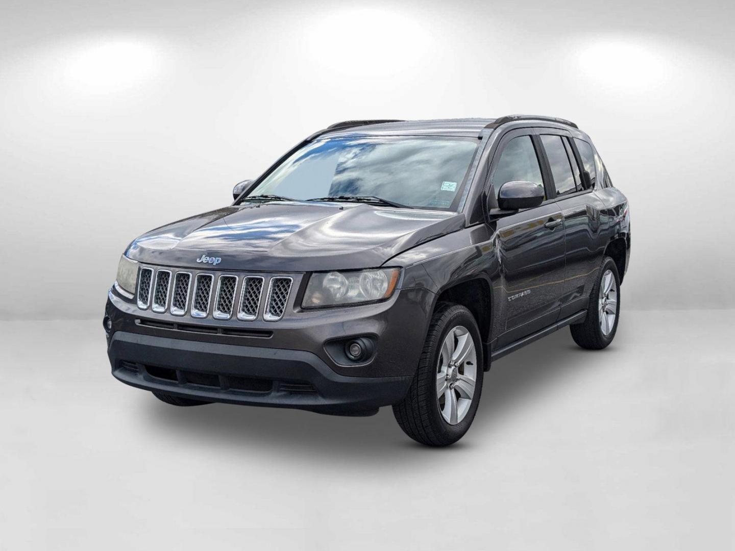 2016 /Dark Slate Gray Jeep Compass Latitude (1C4NJCEA9GD) with an Regular Unleaded I-4 2.0 L/122 engine, 1-Speed CVT w/OD transmission, located at 3959 U.S. 80 W, Phenix City, AL, 36870, (334) 297-4885, 32.469296, -85.135185 - 2016 Jeep Compass Latitude - Photo#2