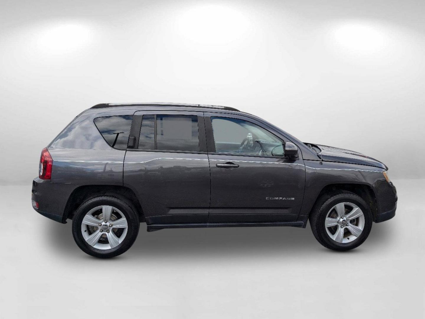 2016 /Dark Slate Gray Jeep Compass Latitude (1C4NJCEA9GD) with an Regular Unleaded I-4 2.0 L/122 engine, 1-Speed CVT w/OD transmission, located at 3959 U.S. 80 W, Phenix City, AL, 36870, (334) 297-4885, 32.469296, -85.135185 - 2016 Jeep Compass Latitude - Photo#5