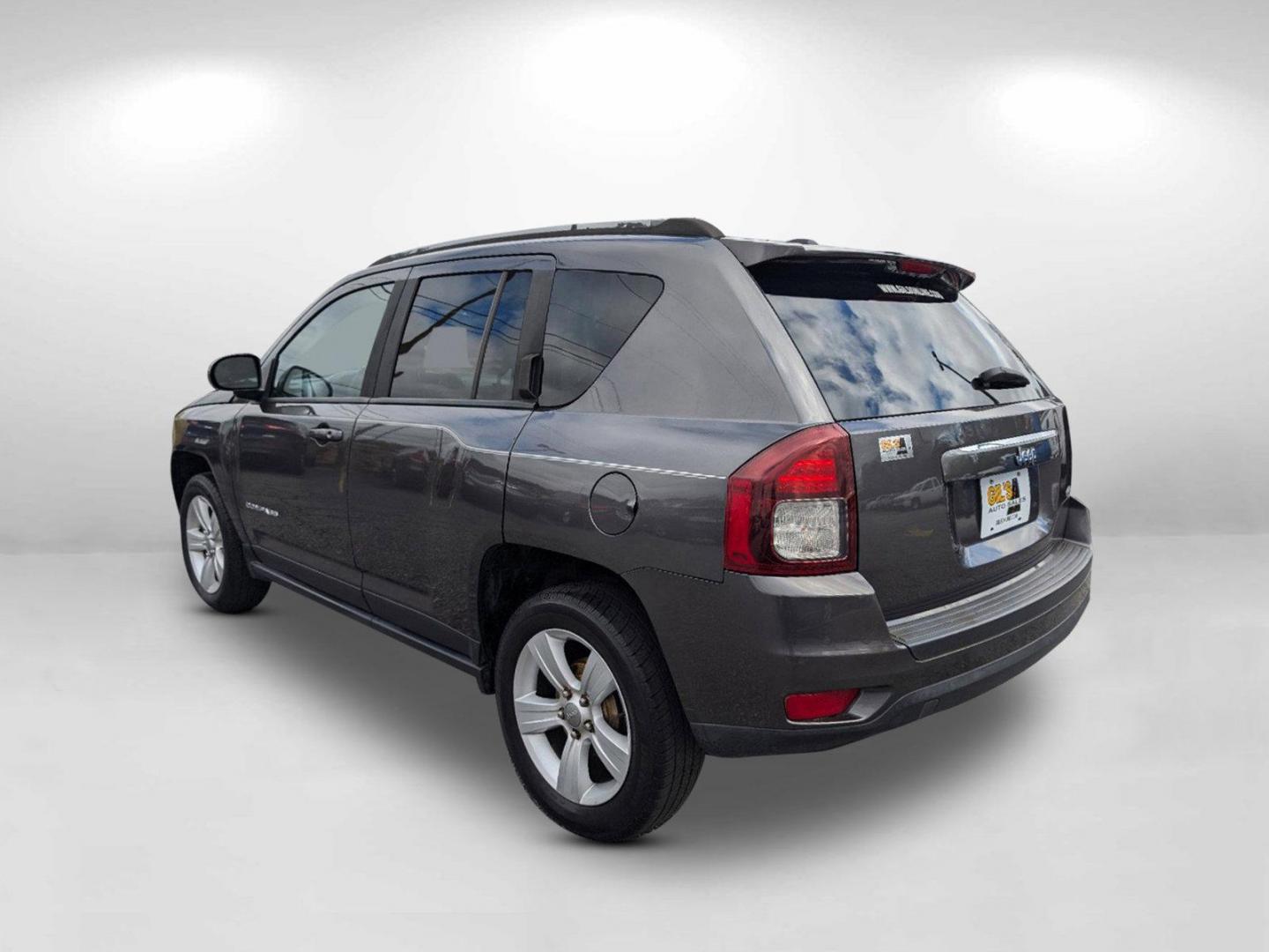 2016 /Dark Slate Gray Jeep Compass Latitude (1C4NJCEA9GD) with an Regular Unleaded I-4 2.0 L/122 engine, 1-Speed CVT w/OD transmission, located at 3959 U.S. 80 W, Phenix City, AL, 36870, (334) 297-4885, 32.469296, -85.135185 - 2016 Jeep Compass Latitude - Photo#8