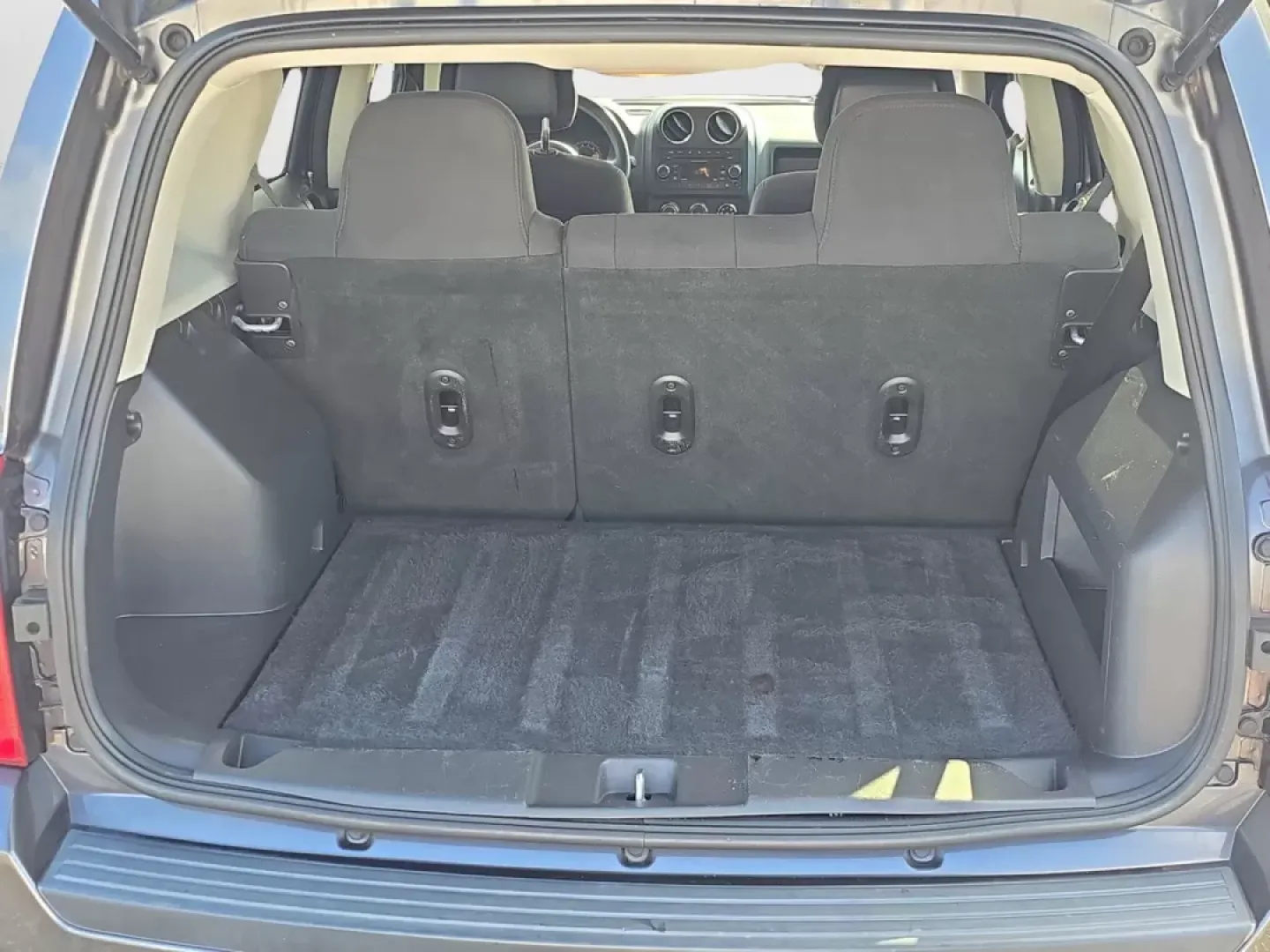 2016 /Dark Slate Gray Jeep Patriot Sport (1C4NJPBA2GD) with an Other engine, located at 804 22nd Ave, Phenix City, AL, 36870, (334) 297-1860, 32.484749, -85.024475 - Elevate your adventures with the unbeatable 2016 Jeep Patriot Sport, now available at Gils Auto in Phenix City, Alabama! This versatile SUV is perfect for weekend getaways, family road trips, or navigating your daily commute with ease. With its spacious interior and rugged build, the Jeep Patriot is - Photo#5