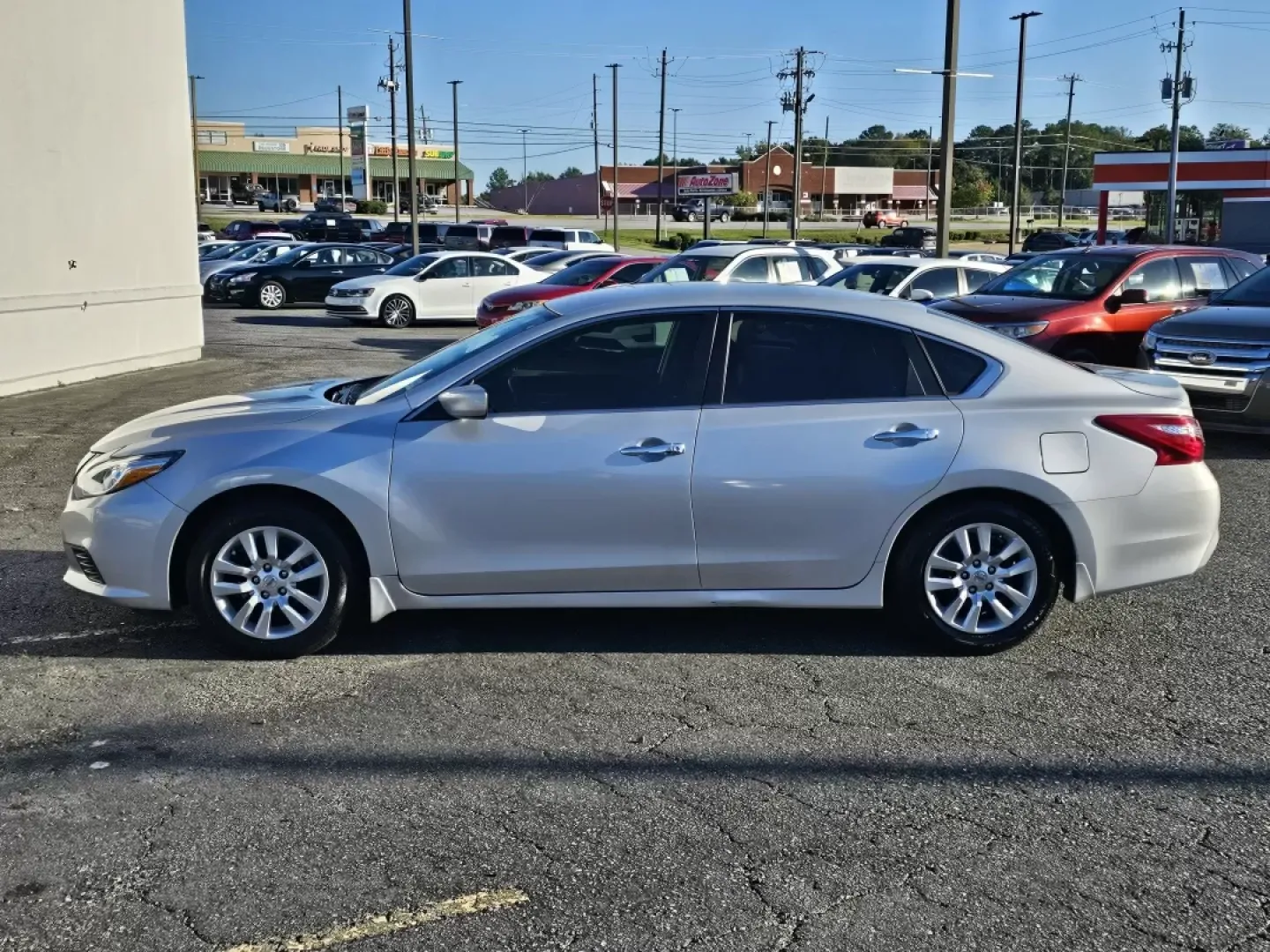 2016 /Charcoal Nissan Altima 2.5 S (1N4AL3AP3GN) with an Other engine, located at 3959 U.S. 80 W, Phenix City, AL, 36870, (334) 297-4885, 32.469296, -85.135185 - **Discover Your Perfect Daily Driver: 2016 Nissan Altima 2.5 S at Gils Auto - Phenix City**<br /> <br /> Are you searching for a reliable sedan that fits seamlessly into your busy lifestyle? Look no further than this stunning 2016 Nissan Altima 2.5 S at Gils Auto in Phenix City, AL. Ideal for daily - Photo#7
