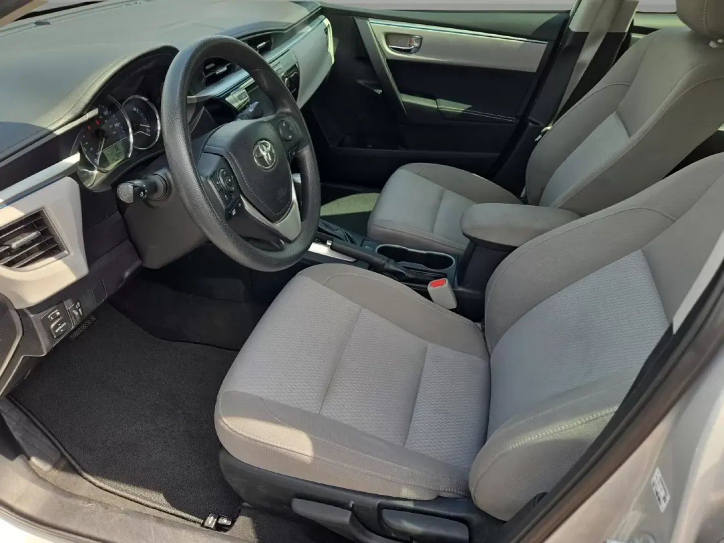 2016 Toyota Corolla (2T1BURHE3GC) with an Other engine, located at 7000 Northlake Connector, Columbus, GA, 31904, (706) 987-8085, 32.524975, -84.978134 - If you're searching for a reliable and budget-friendly vehicle for your daily commutes or weekend adventures, look no further than this 2016 Toyota Corolla, now available at Gils Auto in Phenix City, AL. With a sleek silver exterior and impressive features, this sedan is not just a mode of transport - Photo#11