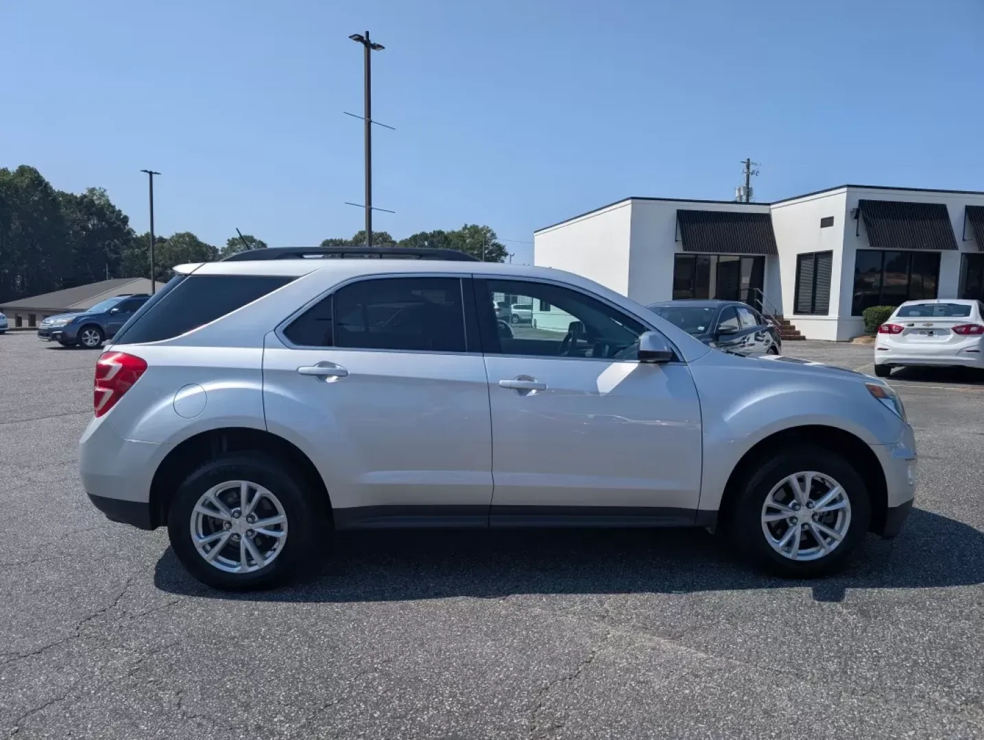 2017 /Jet Black Chevrolet Equinox LT (2GNALCEK7H1) with an Other engine, located at 3959 U.S. 80 W, Phenix City, AL, 36870, (334) 297-4885, 32.469296, -85.135185 - Are you ready to elevate your driving experience while accommodating your lifestyle? Look no further than this stunning 2017 Chevrolet Equinox LT, available at Gils Auto in Phenix City, AL. Whether you're embarking on a family road trip, commuting to work, or exploring the local attractions, this ve - Photo#3