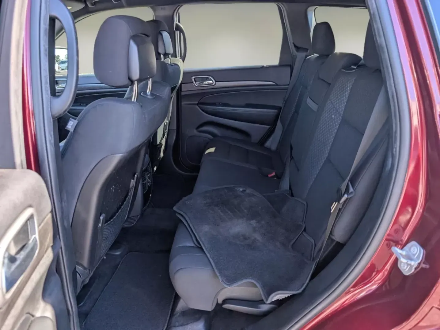 2018 /Black Jeep Grand Cherokee Laredo E (1C4RJEAG6JC) with an Other engine, located at 3959 U.S. 80 W, Phenix City, AL, 36870, (334) 297-4885, 32.469296, -85.135185 - Experience the thrill of adventure and the comfort of a family-friendly ride with the 2018 Jeep Grand Cherokee Laredo E, now available at Gils Auto in Phenix City, AL. This sleek Velvet Red Pearlcoat SUV perfectly balances rugged utility and modern sophistication, making it an ideal choice for weeke - Photo#16