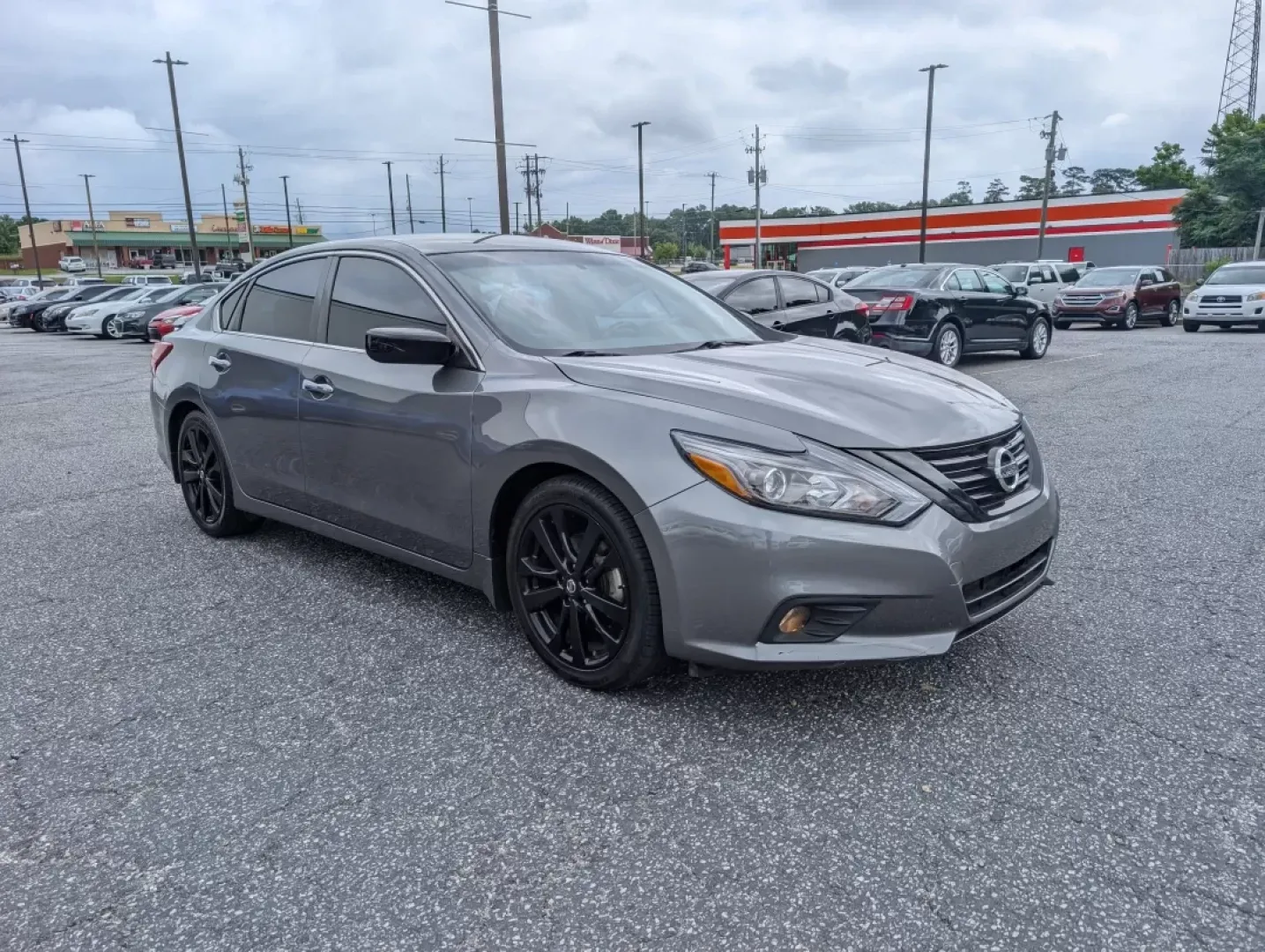 2018 /Sport Interior Nissan Altima 2.5 SR (1N4AL3AP3JC) with an Other engine, located at 3959 U.S. 80 W, Phenix City, AL, 36870, (334) 297-4885, 32.469296, -85.135185 - Experience the perfect blend of style, comfort, and functionality with the 2018 Nissan Altima 2.5 SR, now available at Gils Auto in Phenix City, AL. This sedan is ideal for those who navigate daily commutes, run errands for growing families, or seek the weekend adventure. With its striking Gun Metal - Photo#2