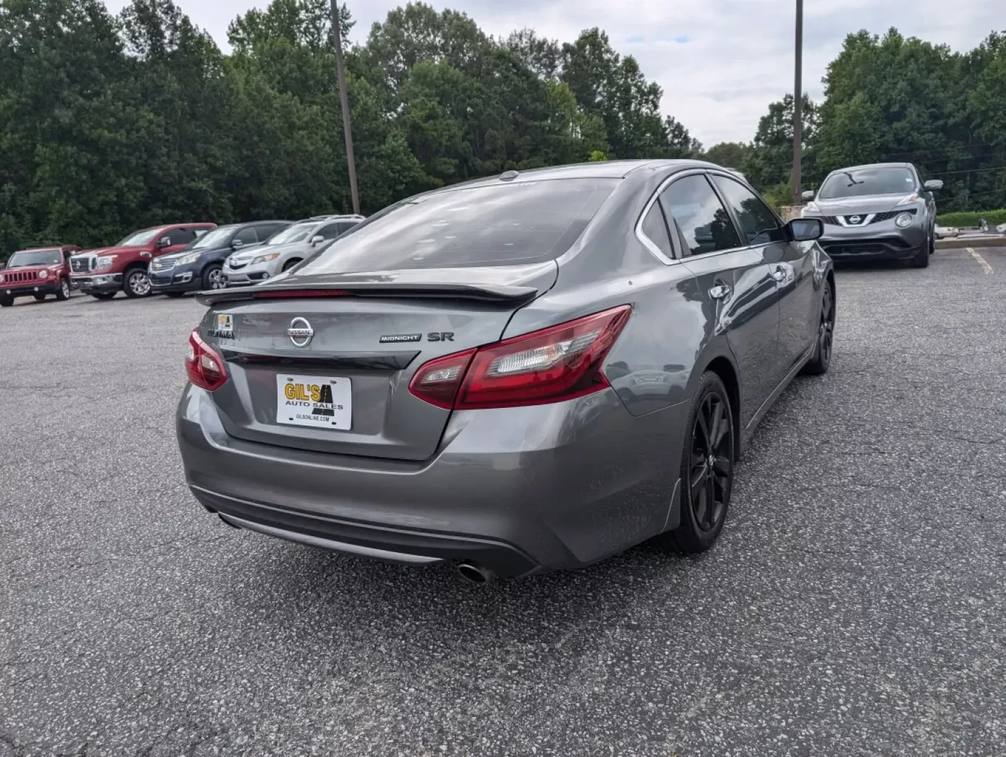 2018 /Sport Interior Nissan Altima 2.5 SR (1N4AL3AP3JC) with an Other engine, located at 3959 U.S. 80 W, Phenix City, AL, 36870, (334) 297-4885, 32.469296, -85.135185 - Experience the perfect blend of style, comfort, and functionality with the 2018 Nissan Altima 2.5 SR, now available at Gils Auto in Phenix City, AL. This sedan is ideal for those who navigate daily commutes, run errands for growing families, or seek the weekend adventure. With its striking Gun Metal - Photo#4