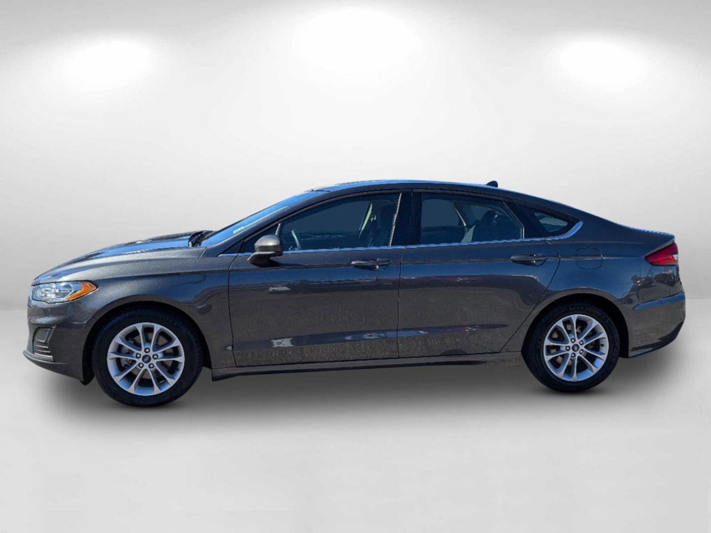 2020 Ford Fusion SE (3FA6P0HD8LR) with an Intercooled Turbo Regular Unleaded I-4 1.5 L/91 engine, 6-Speed Automatic w/OD transmission, located at 1430 Gateway Drive, Opelika, AL, 36801, (334) 239-0944, 32.637871, -85.409790 - 2020 Ford Fusion SE - Photo#7