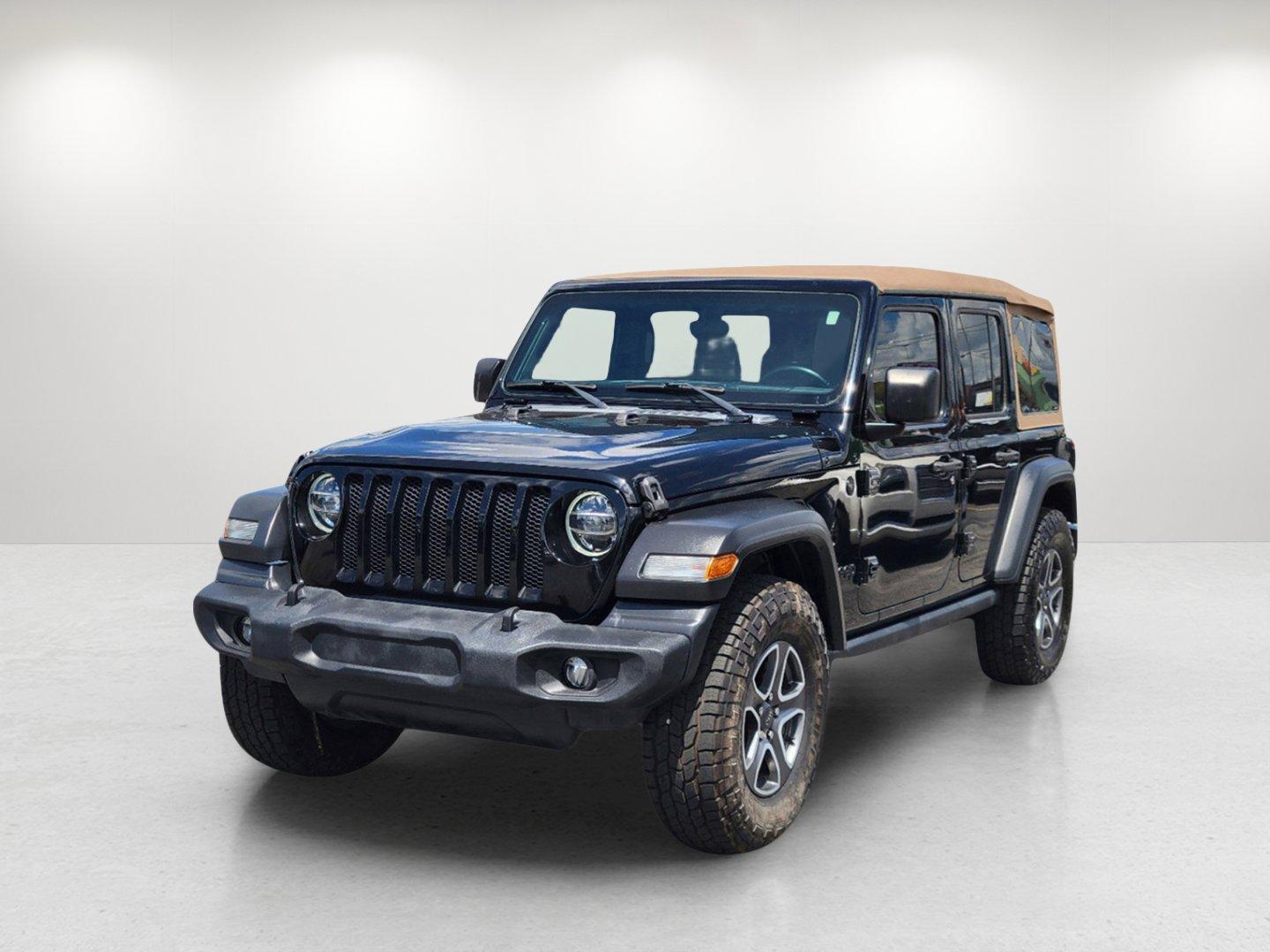 2020 Black Clearcoat /Heritage Tan/Black Jeep Wrangler Unlimited Black and Tan (1C4HJXDG9LW) with an Regular Unleaded V-6 3.6 L/220 engine, 8-Speed Automatic w/OD transmission, located at 804 22nd Ave, Phenix City, AL, 36870, (334) 297-1860, 32.484749, -85.024475 - 2020 Jeep Wrangler Unlimited Black and Tan - Photo#0